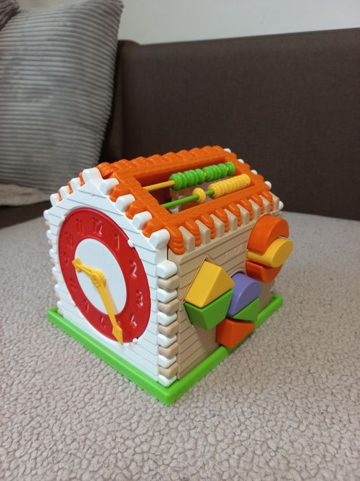 Іграшка-сортер для дітей,годинник