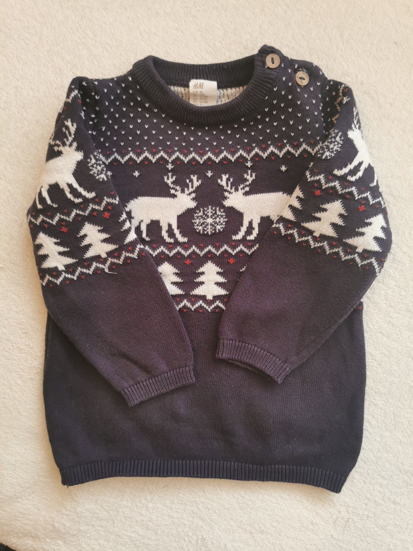 Granatowy sweter z motywem reniferów i choinek H&M rozm. 86