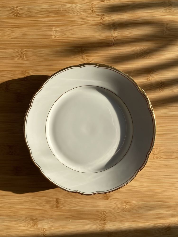 Антикварний посуд тарілки соусниця