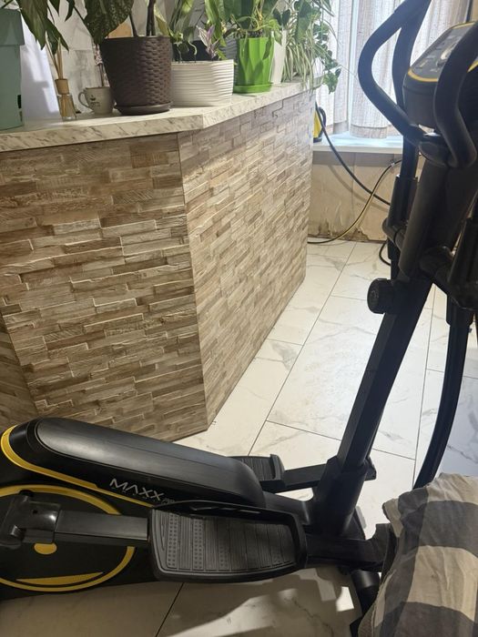 Орбітрек тренажер MaxxPro E7.