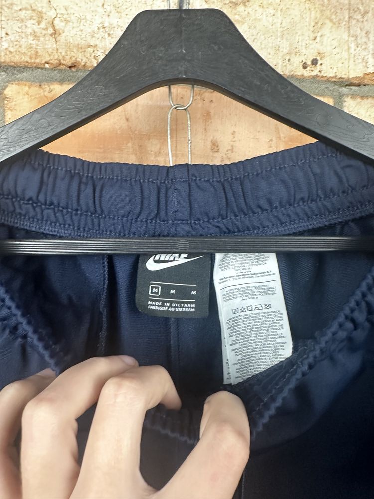 Синие штаны Nike