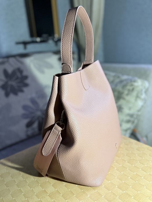 Жіноча сумка OCHNIK рожева з ремінцем