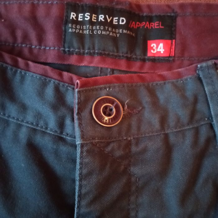 Męskie spodnie Reserved 34
