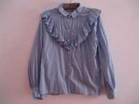 Koszula w jaskółki firmy Sfera Basic niebieska z żabotem 38 M