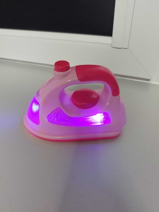 Zabawka żelazko grające świecące