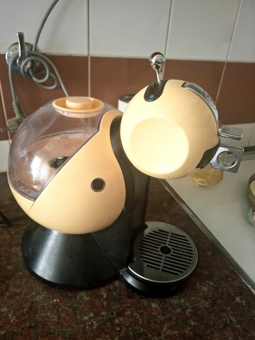 Máquina de cafe  dolce gusto