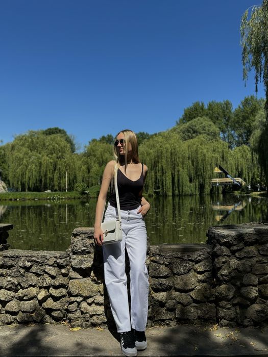 Джинси білі 36.