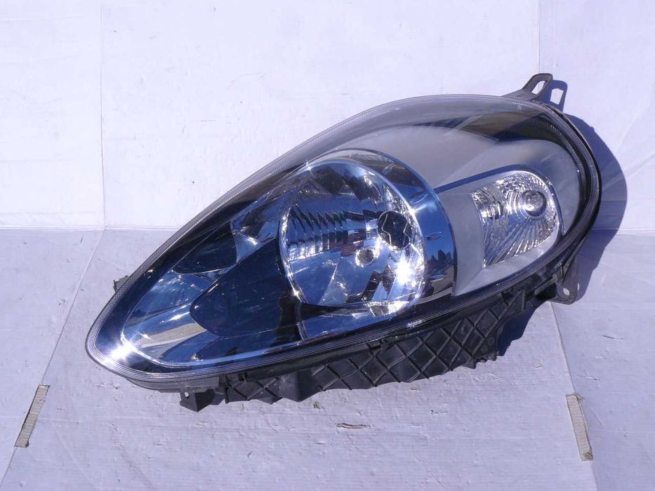 FIAT PUNTO EVO 2012 Lampa przednia lewa oryginał