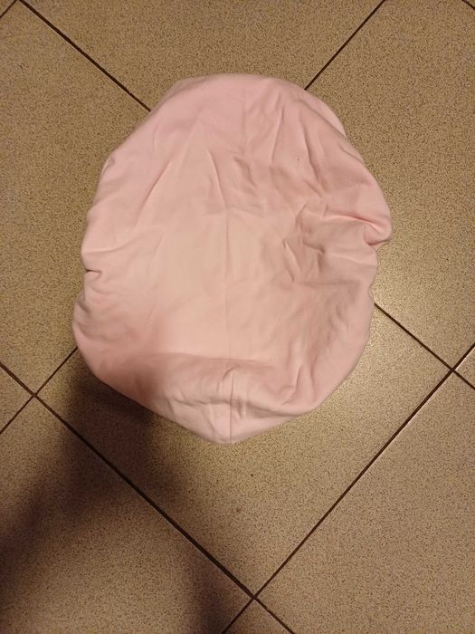 Otulacz dla noworodka w kolorze różowym