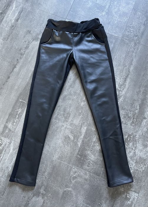 Nowe legginsy dla dziewczynki rozmiar 140 cm skórzany przód