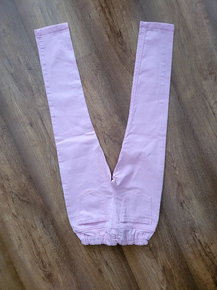 Spodnie pudrowy róż jeans C&A 134 dla dziewczynki