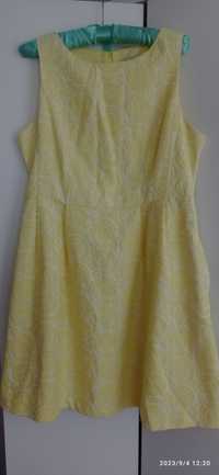 Żółta piękna sukienka rozmiar L, do kolan wytłaczany wzór