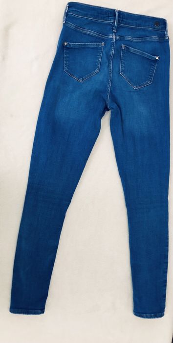 River Island Molly spodnie z dziurami