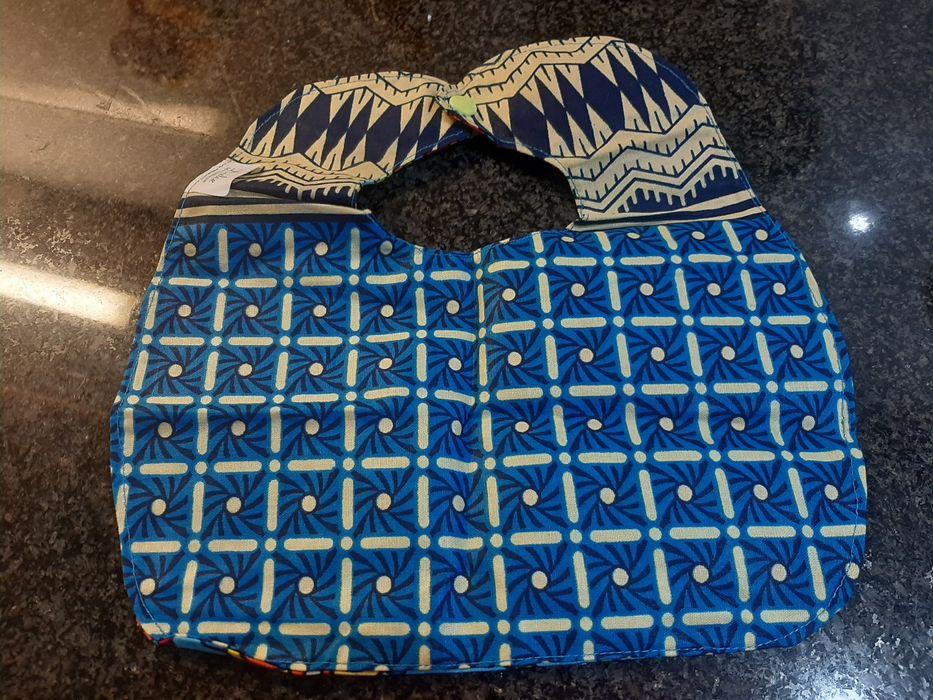 Conjunto babete e porta chucha NOVO.