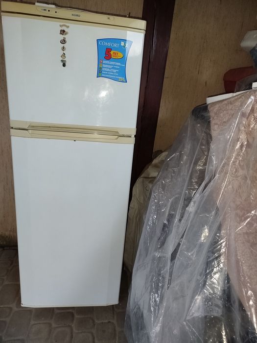 Продам холодильник NORD  з морозильною камерою.Висота 160 см