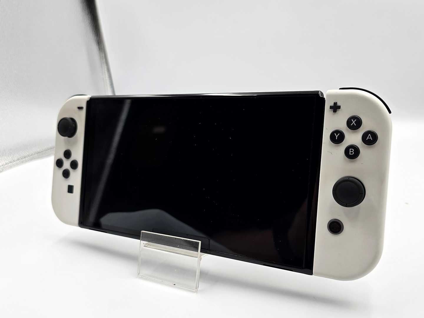NINTENDO SWITCH OLED +2 gry Spongebob + Super Mario 3D World GWARANCJA