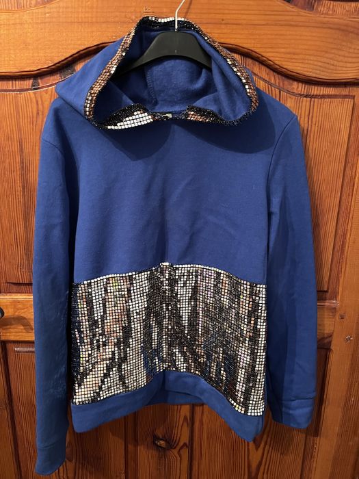 Стильні нові кофти і блузи