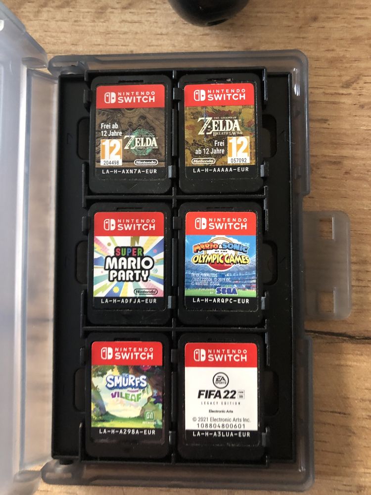 Sprzedam gry na nintendo switch  zelda fifa  smerfy super mario party