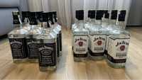 Пустые бутылки Jim Beam и Jack Daniels