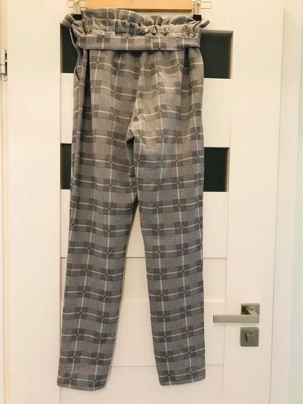 Spodnie w kratę kratkę wysoki stan z paskiem i falbaną 40 L