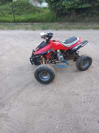 Quad czerwony poj.125