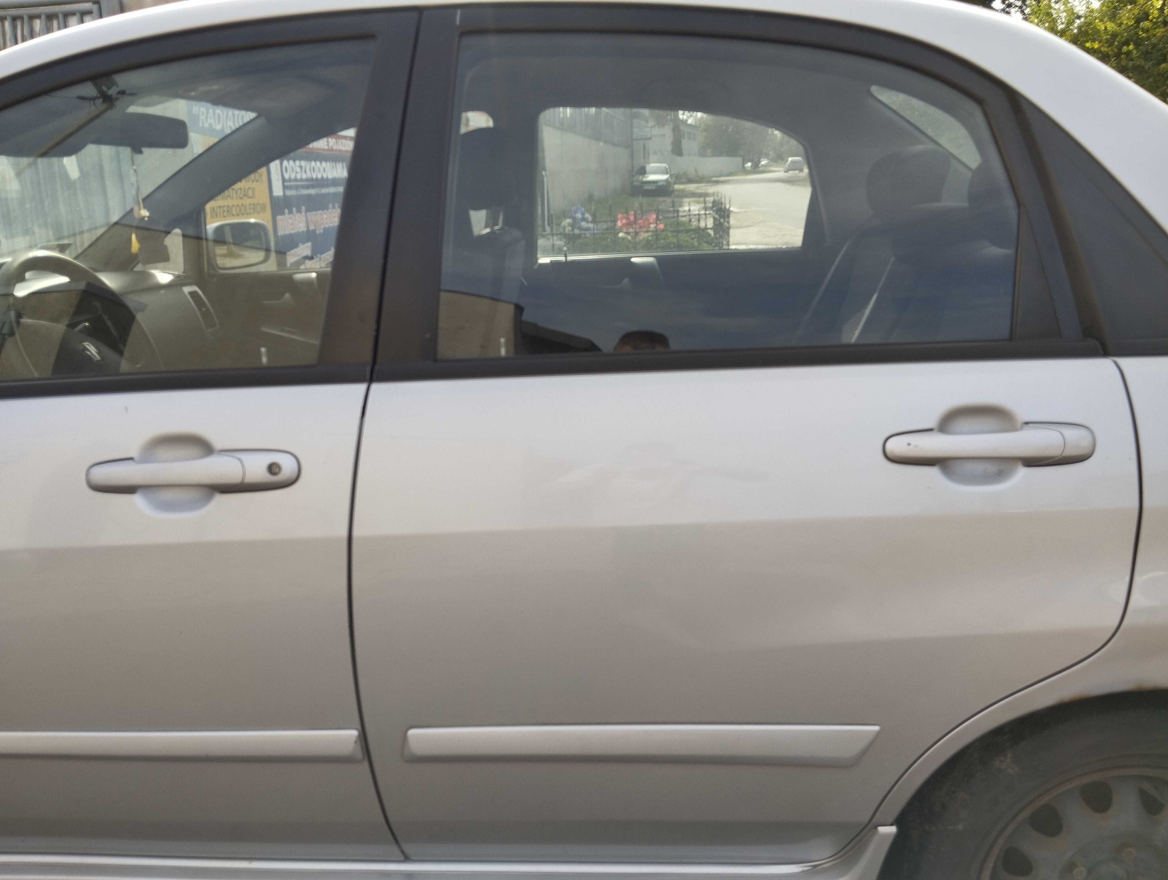 Suzuki Liana 1.6i 4D Sedan 2004r.Drzwi tylne lewe.