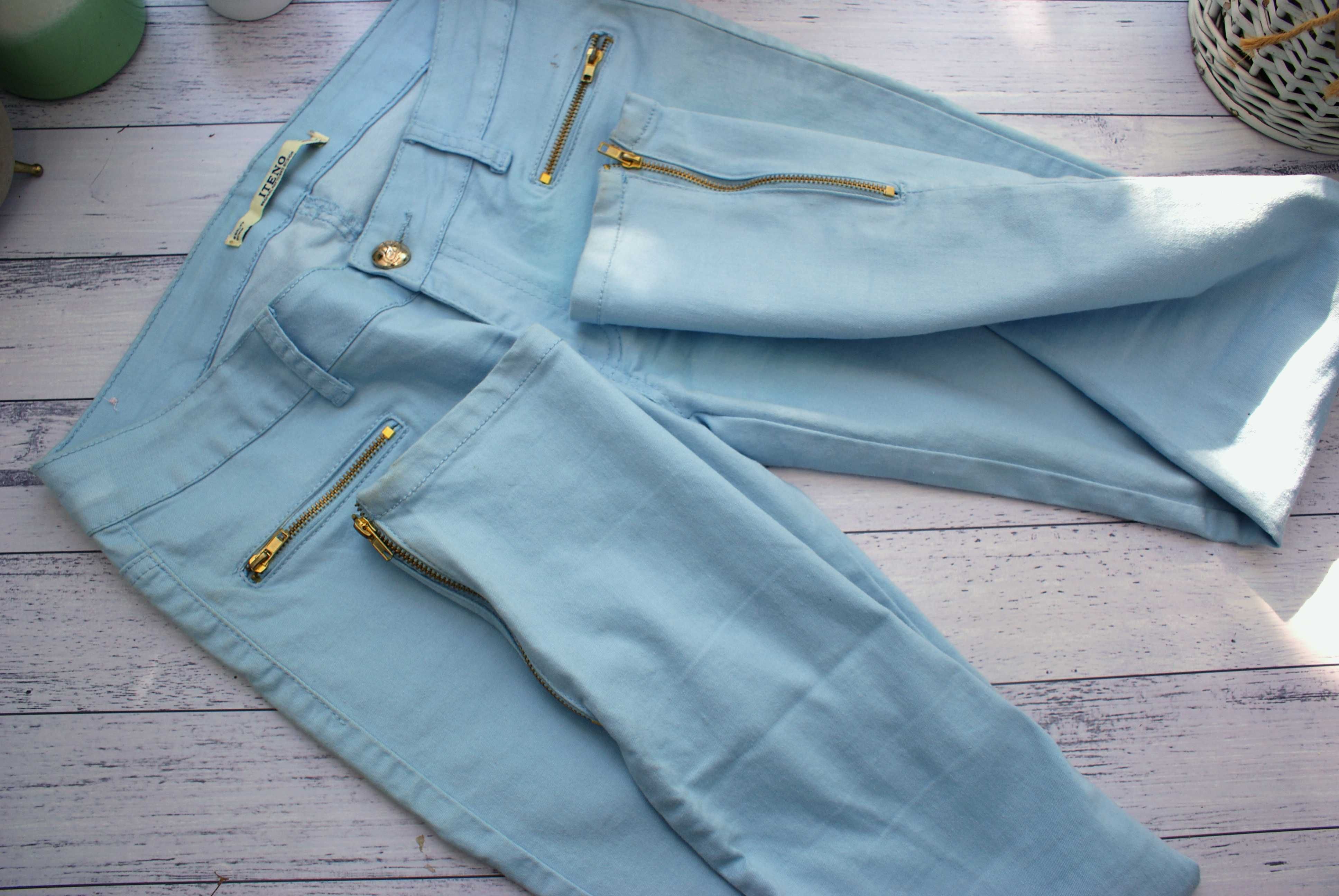 Iteno wiosenne spodnie błekitne niebieskie rurki skinny złote zamki ML