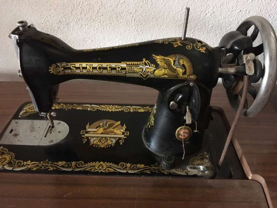 Máquina de costura singer