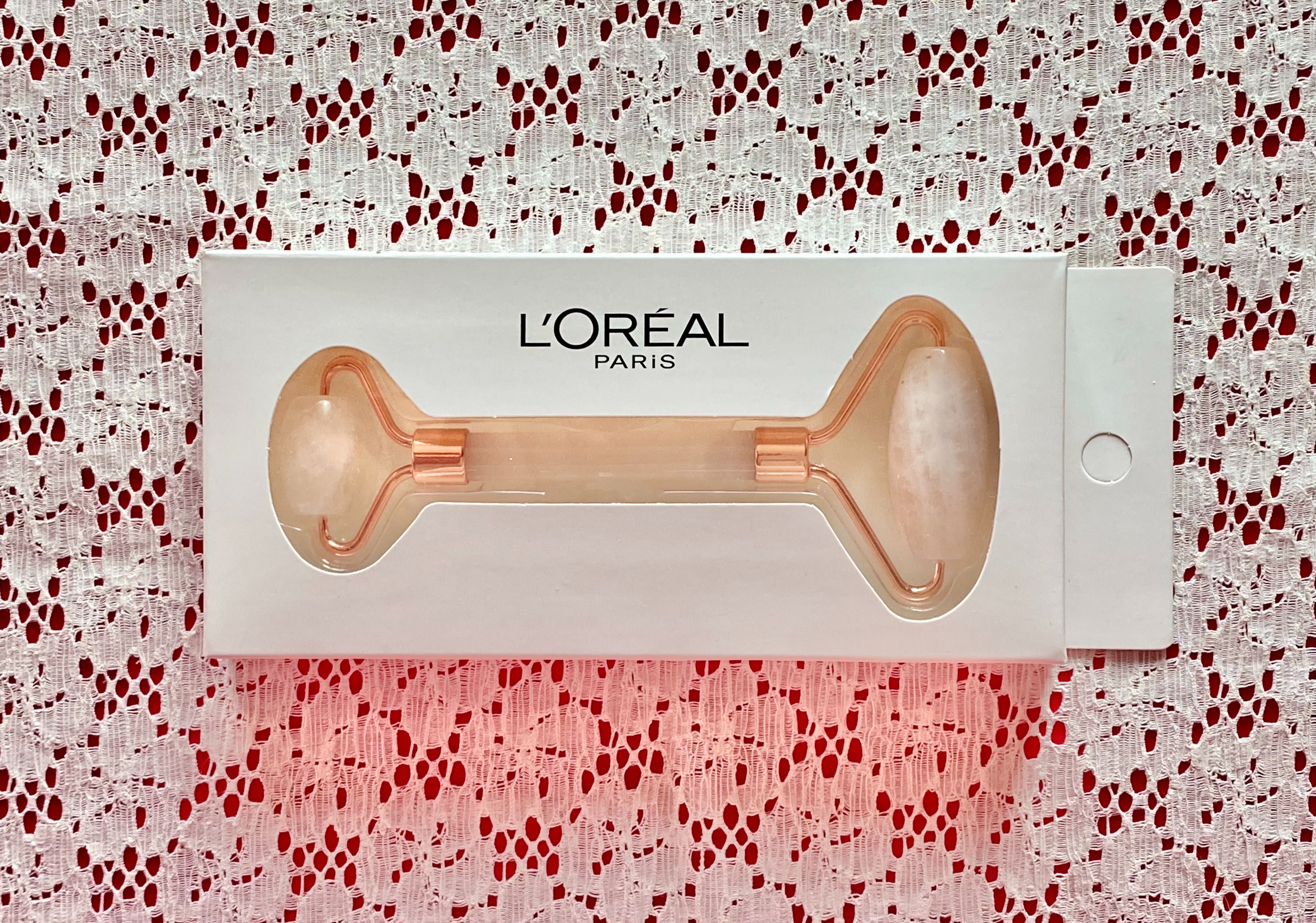 Массажный роллер из розового кварца L’ORÉAL. Роликовый массажор