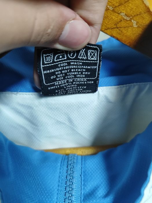 Біло-синя спортивка від бренду локост