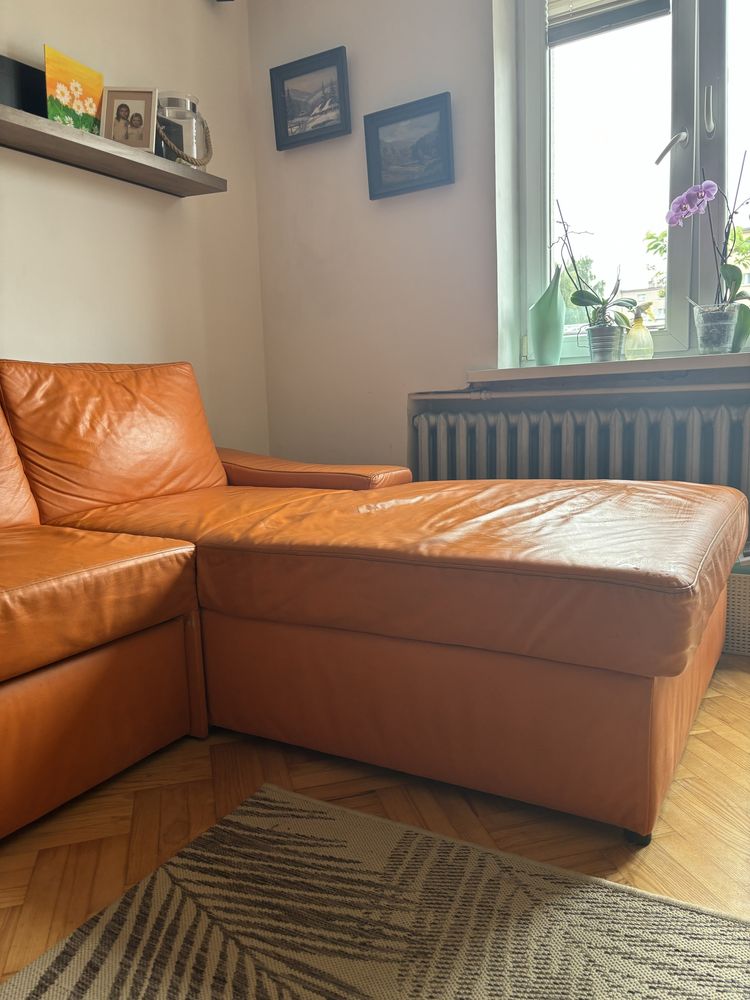 Skórzany pomarańczowy narożnik z funkcją spania