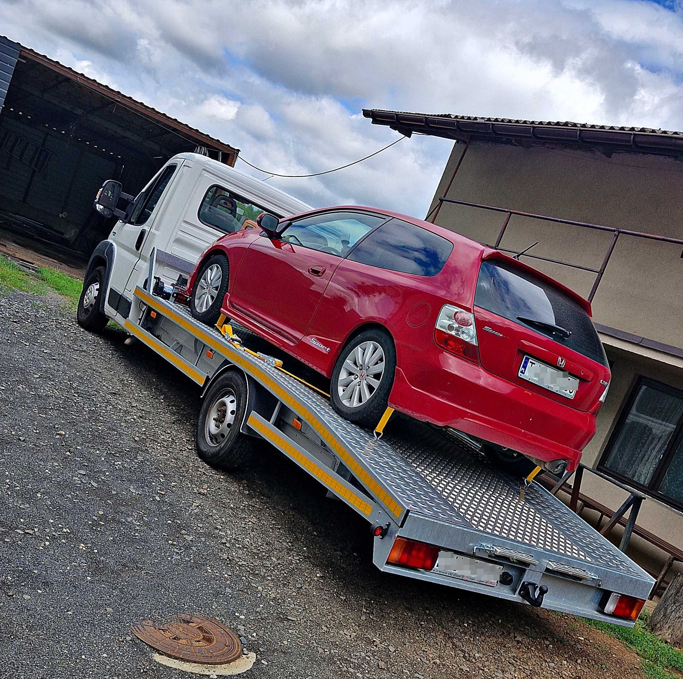 Laweta Pomoc Drogowa Transport Dowóz Paliwa Autolaweta Holowanie
