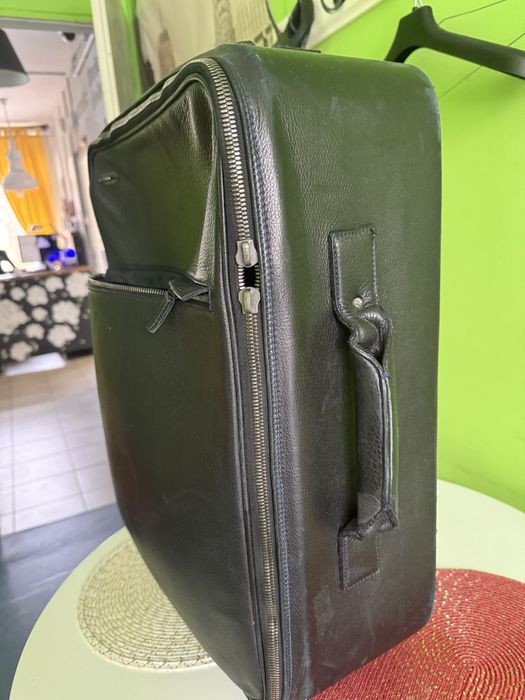 Używana, skórzana walizka, wymaga naprawy składanego uchwytu