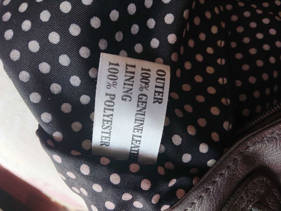 Mala castanha em pele