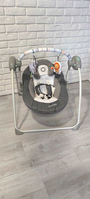 LIONELO RUBEN leżaczek, elektryczny bujaczek, huśtawka z melodiami.