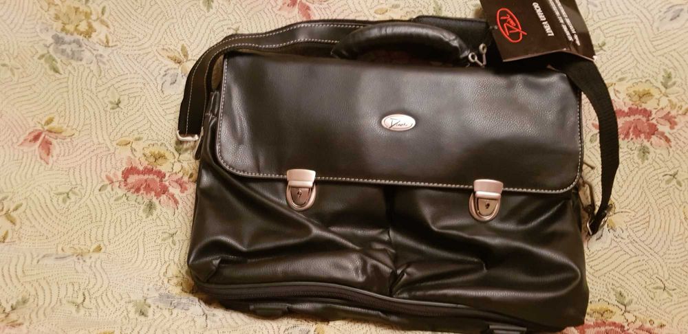 Продам новый кожаный мцжской портфель