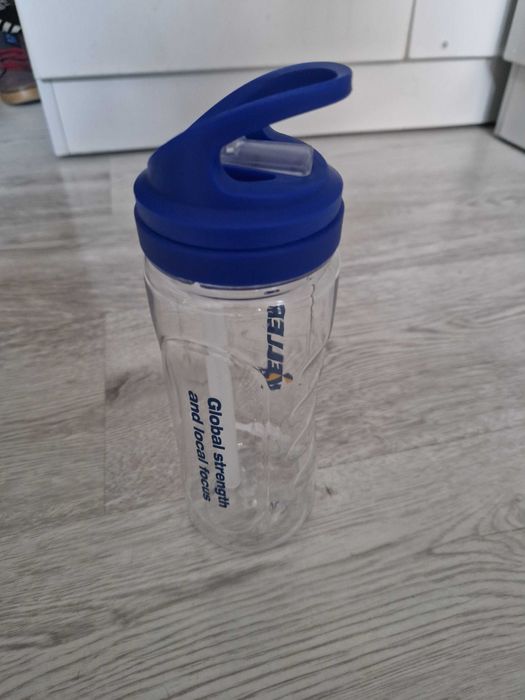 Bidon na wodę / rower z ustnikiem - niebieski / przezroczysty