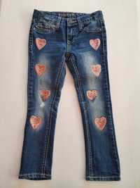 Spodnie jeansowe z regulacją rurki 104 cekiny serduszka