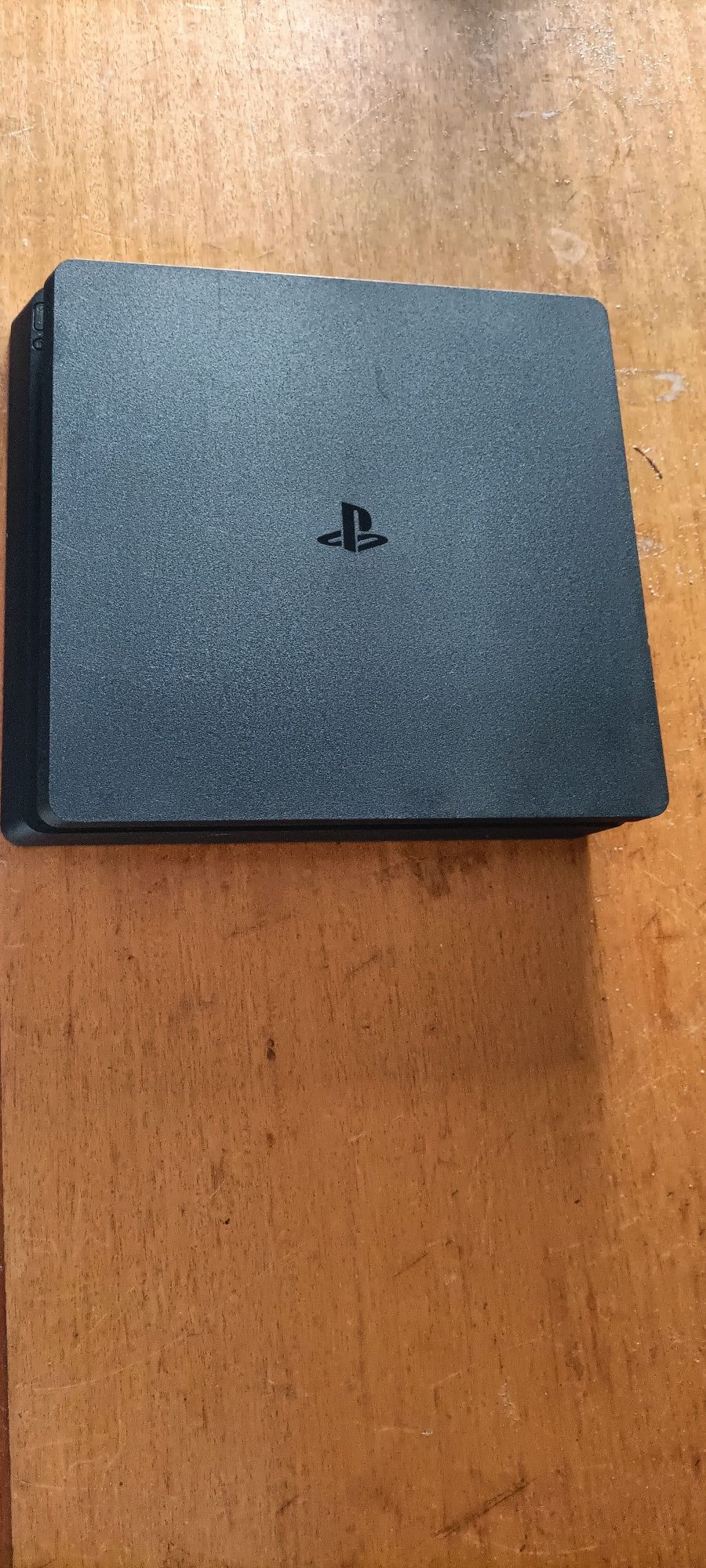 PS4 Slim 500gb com comando original, capa vermelha, 7 jogos originais
