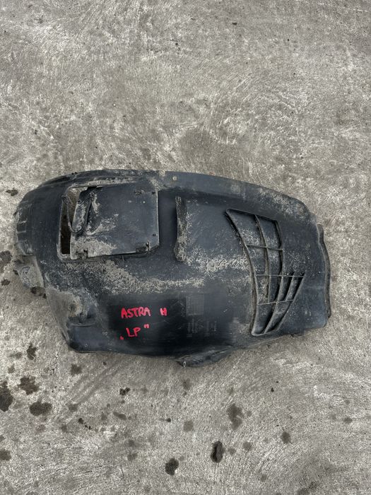 Nadkole Opel Astra H lewy przód