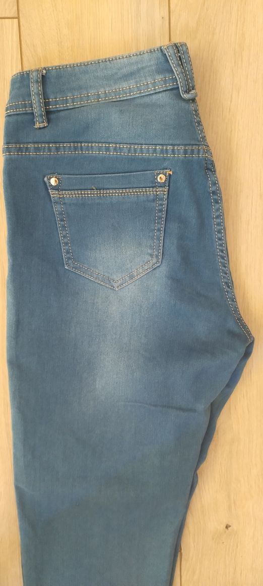 Damskie spodnie jeansy