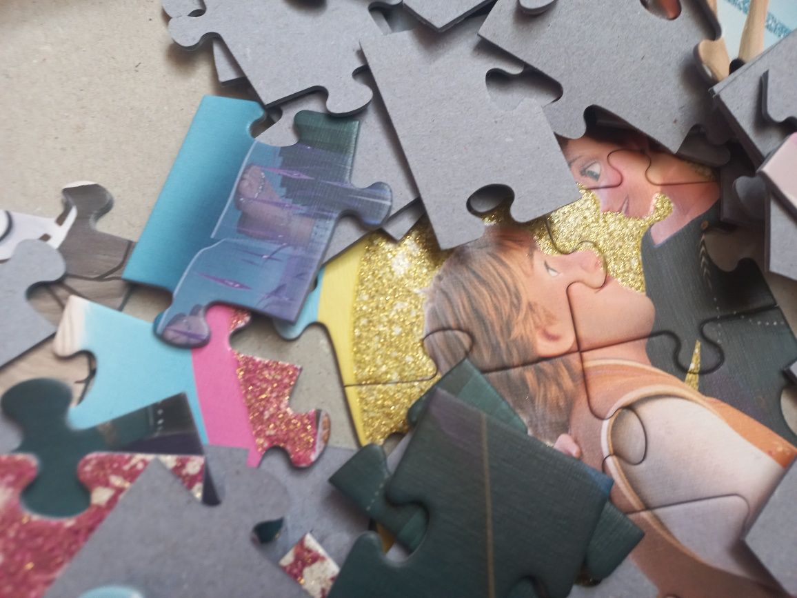 Puzzle błyszczące brokatowe Kraina Lodu 100 elementów Trefl