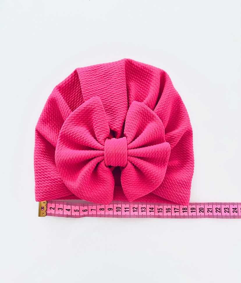 Różowa czapka z kokardką dla dziewczynki
