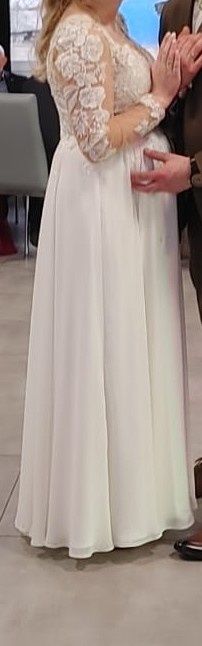 Suknia ślubna z rękawkami