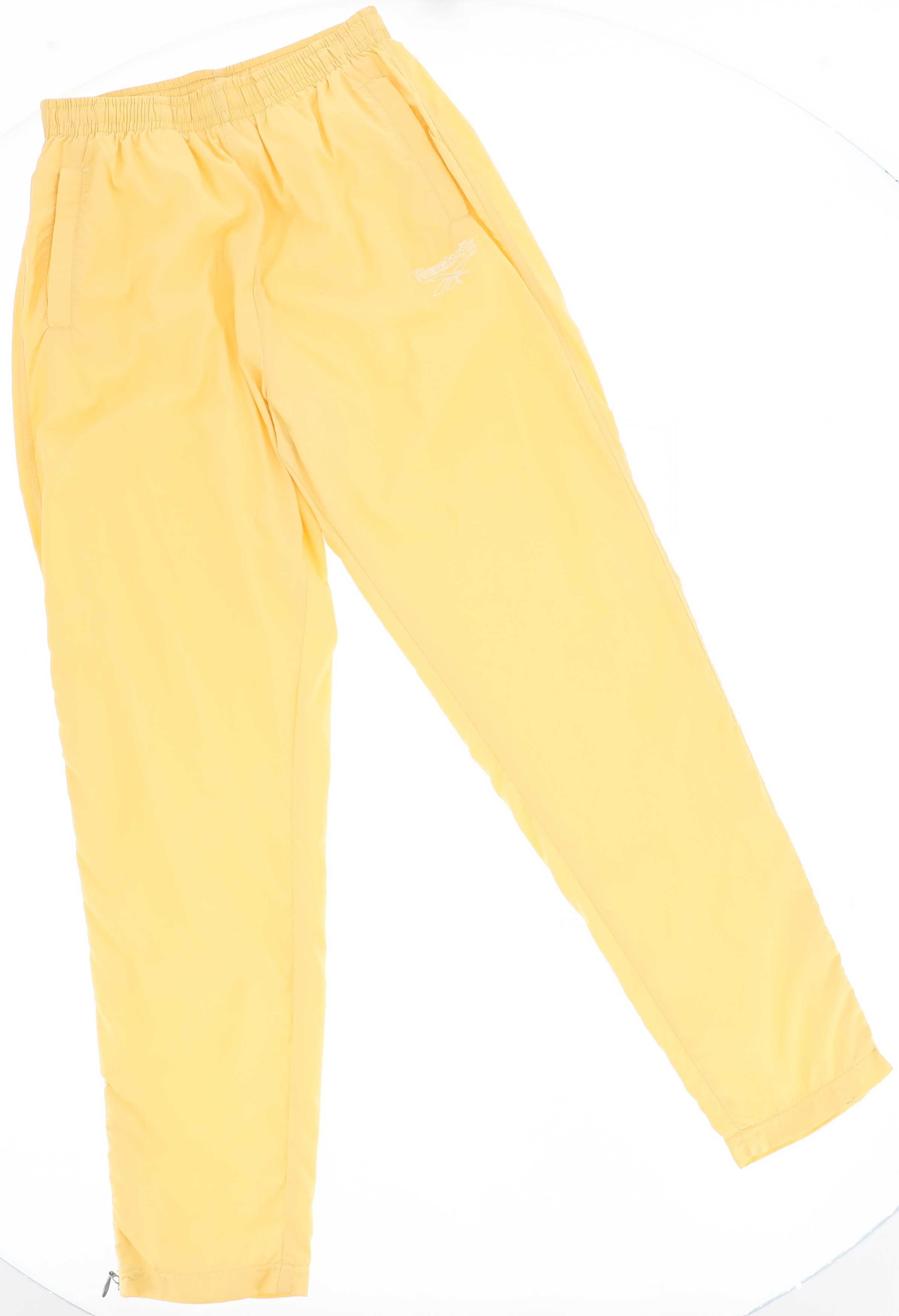 Żółte spodnie sportowe marki Reebok, rozmiar 40