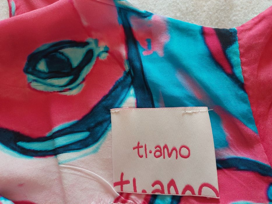 Macacão Estampado Fundo Rosa, M