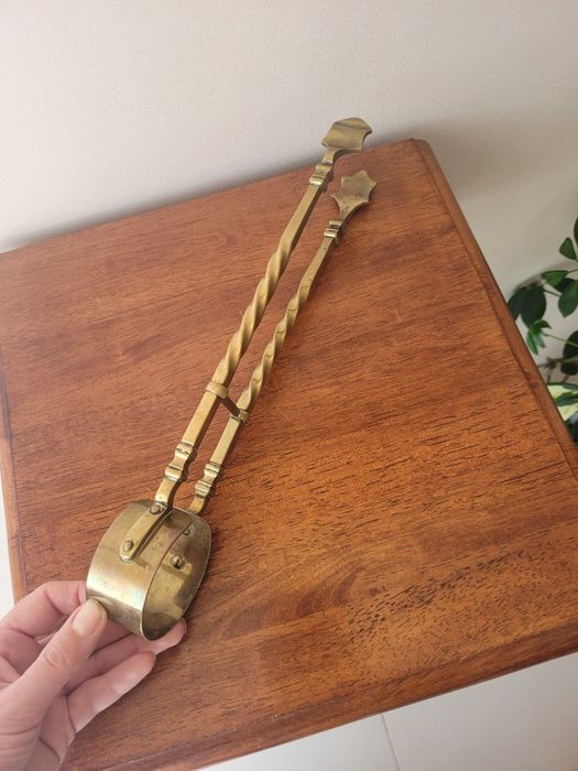 Mosiężny chwytak kominkowy