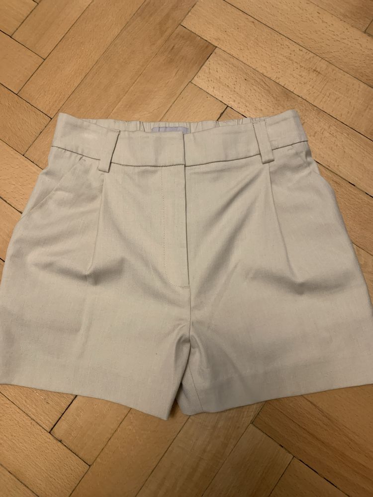 Bezowe spodenki eleganckie HM