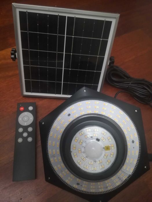 Solarna lampa z czujnikiem ruchu na zewnątrz i do środka , pilot.