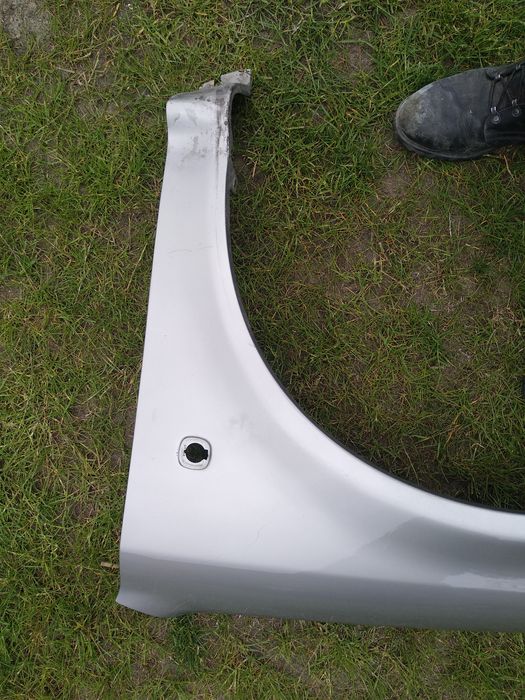 Błotnik lewy przód Skoda Octavia I kolor 9202